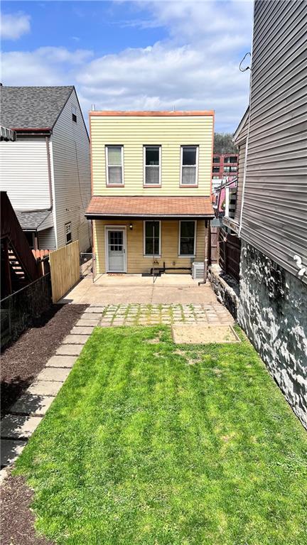 5266 Natrona Way Pittsburgh, PA 15201 - Photo 2 of 13 a view of a house with a yard porch and sitting area