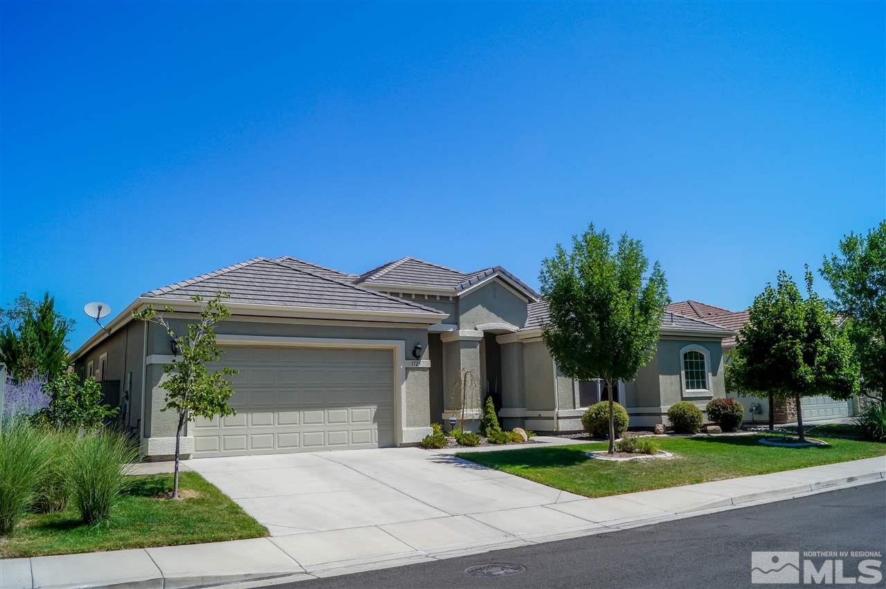 1725 Gold Belt Drive Reno, NV 89521 - Photo 3 of 23 a front view of a house with a garden and plants