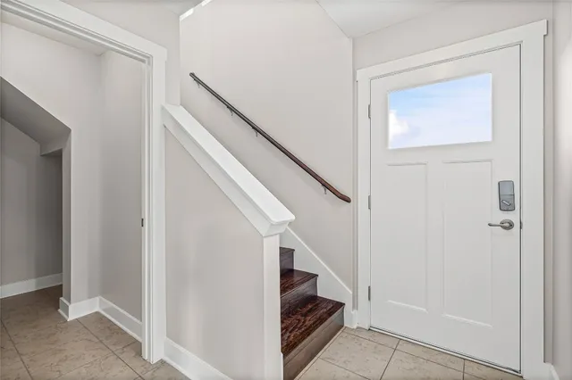 a view of entryway and hall with a hallway