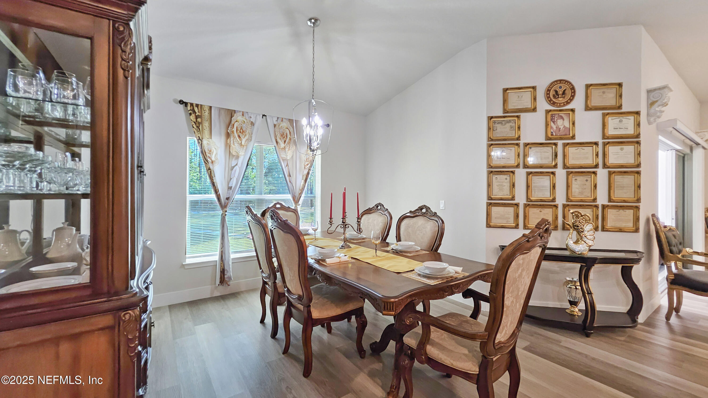 7 Smith Trail Palm Coast, FL 32164 - Photo 17 of 48 a view of a dining room with furniture window and wooden floor