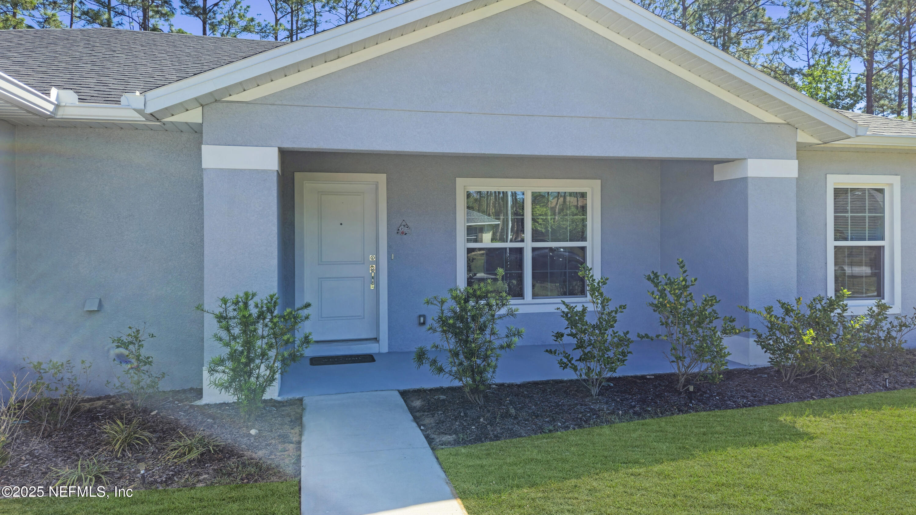 7 Smith Trail Palm Coast, FL 32164 - Photo 7 of 48 a view of a house with a garden