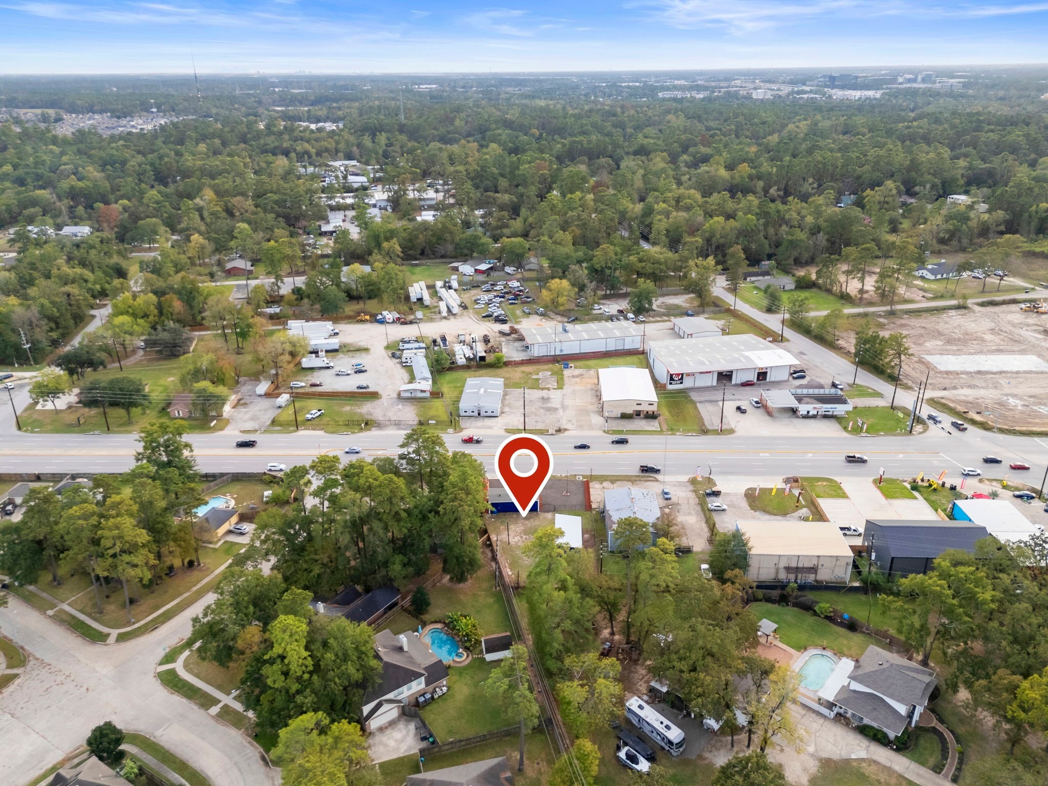 1635 Rayford Road Spring, TX 77386 - Photo 11 of 50 an aerial view of residential houses with outdoor space and trees