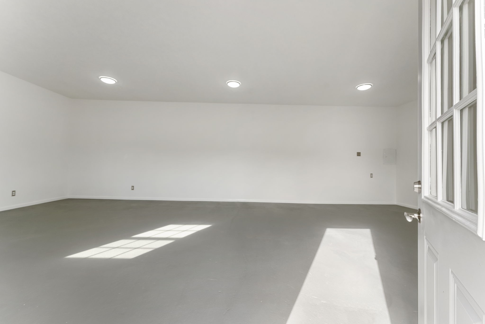 1635 Rayford Road Spring, TX 77386 - Photo 12 of 50 an empty room with wooden floor and windows