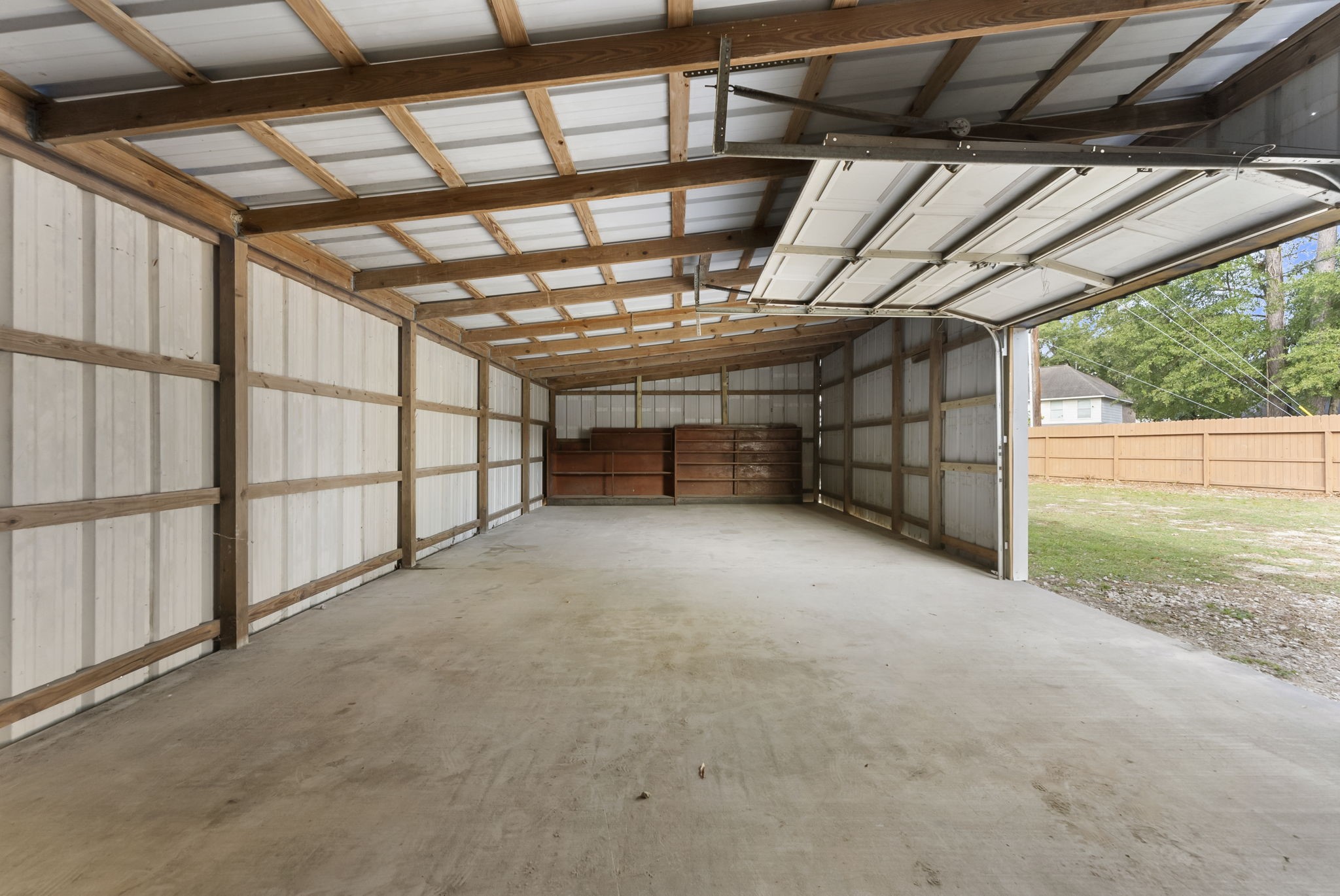 1635 Rayford Road Spring, TX 77386 - Photo 31 of 50 a view of empty room with wooden walls