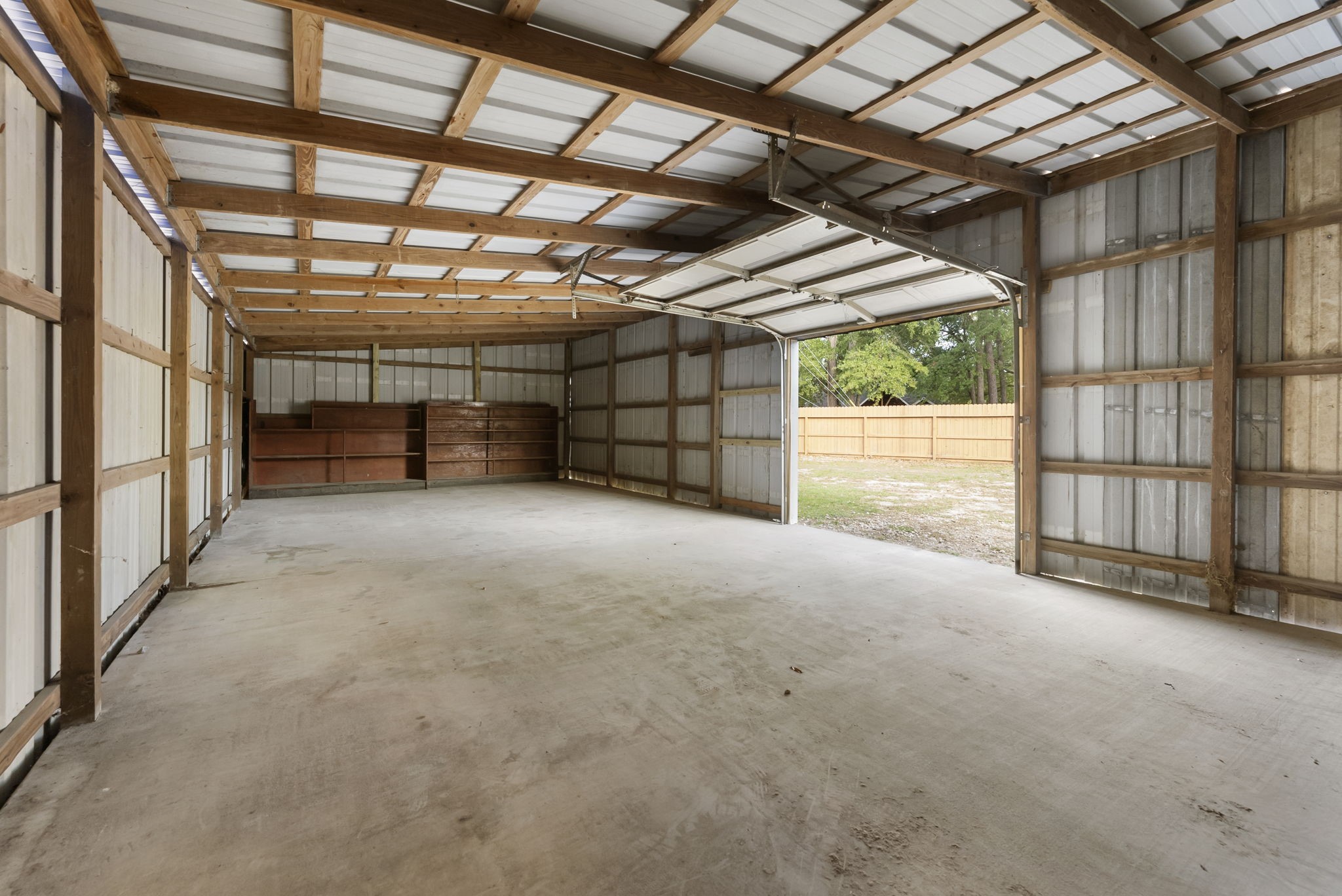 1635 Rayford Road Spring, TX 77386 - Photo 32 of 50 a view of empty room with wooden walls