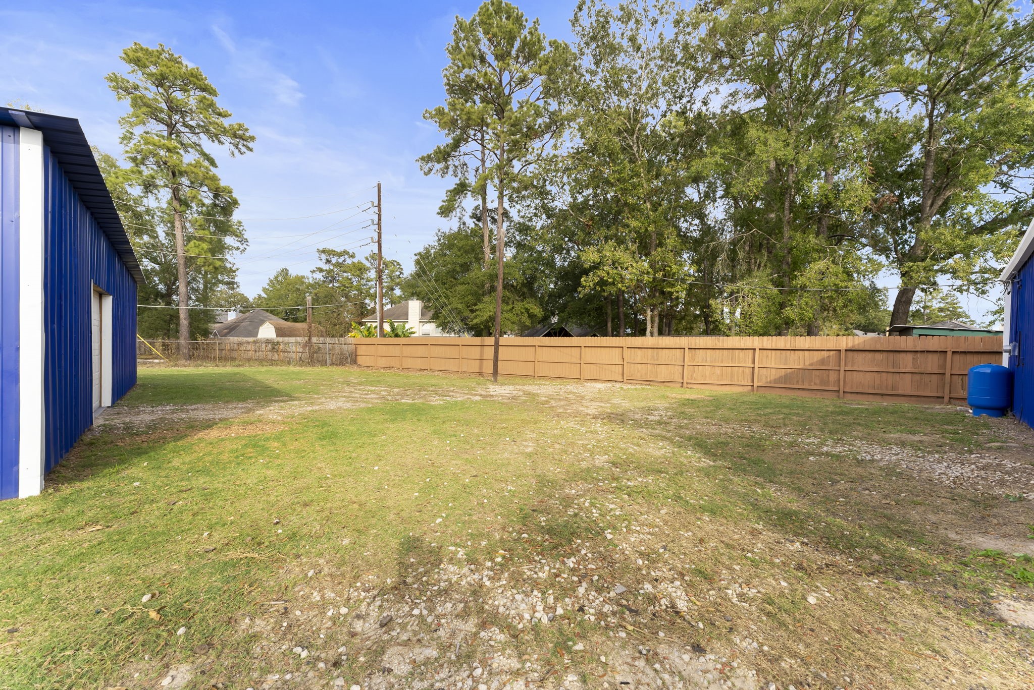 1635 Rayford Road Spring, TX 77386 - Photo 37 of 50 a view of a yard with a trees