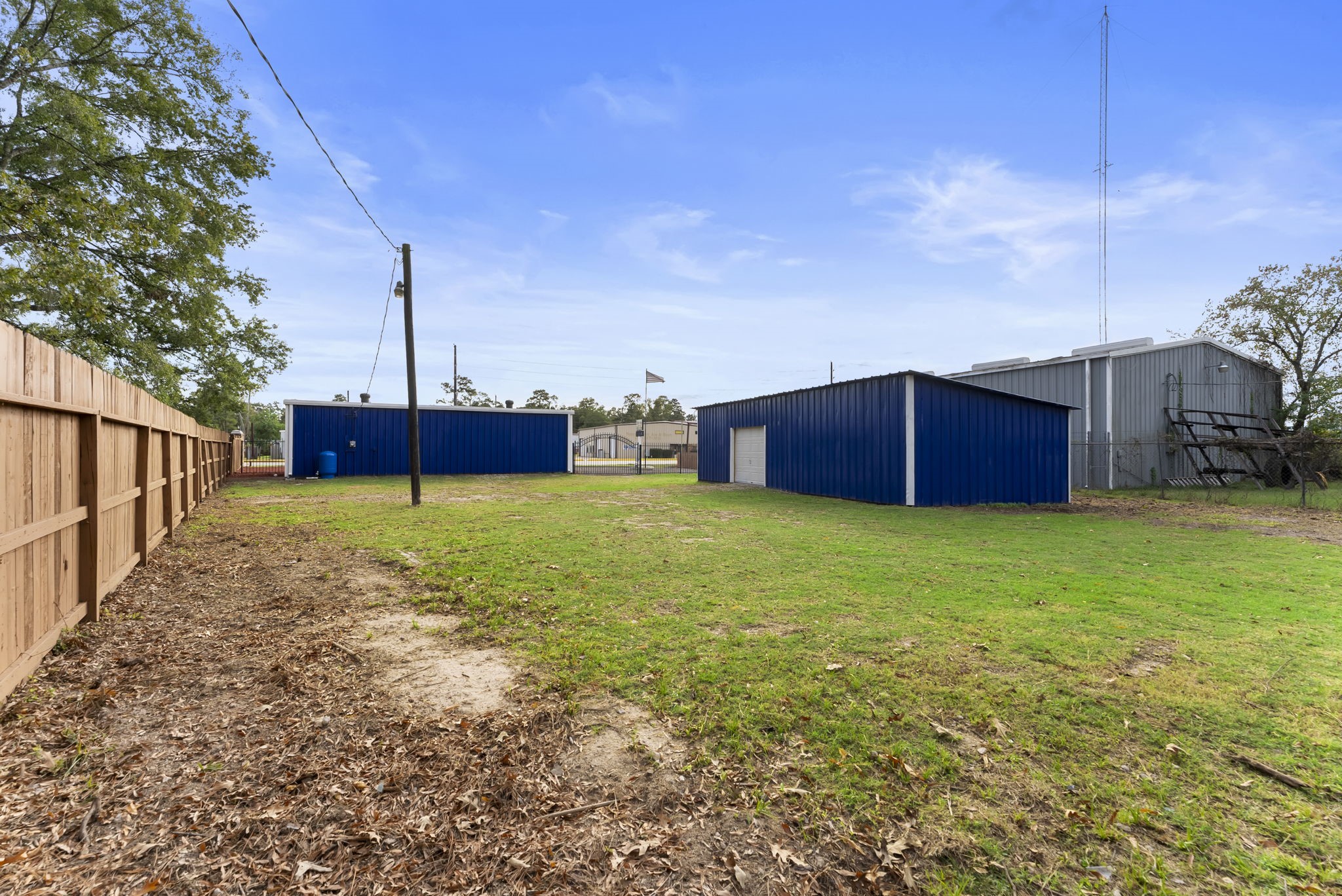 1635 Rayford Road Spring, TX 77386 - Photo 39 of 50 a view of a house with backyard and trees