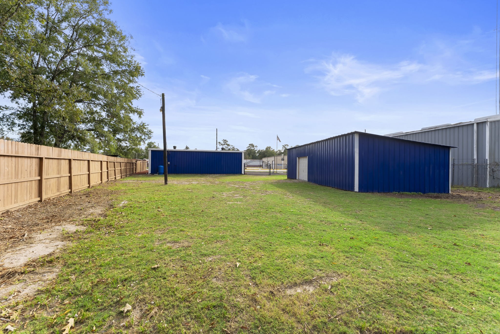 1635 Rayford Road Spring, TX 77386 - Photo 41 of 50 a view of a house with backyard and sitting area