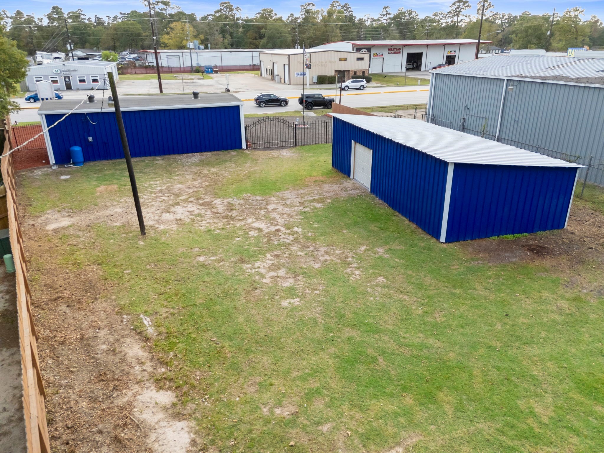 1635 Rayford Road Spring, TX 77386 - Photo 5 of 50 a view of kitchen with kitchen island and wooden cabinets