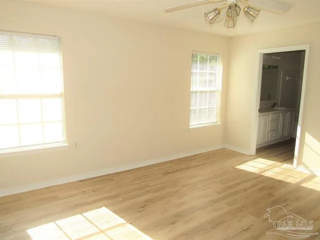 a view of an empty room and window