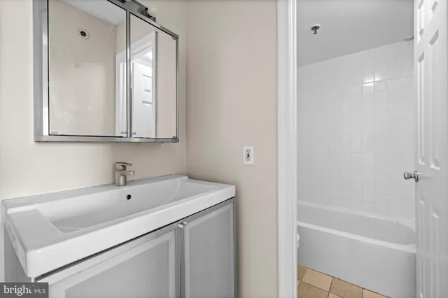 a bathroom with a sink and a bathtub