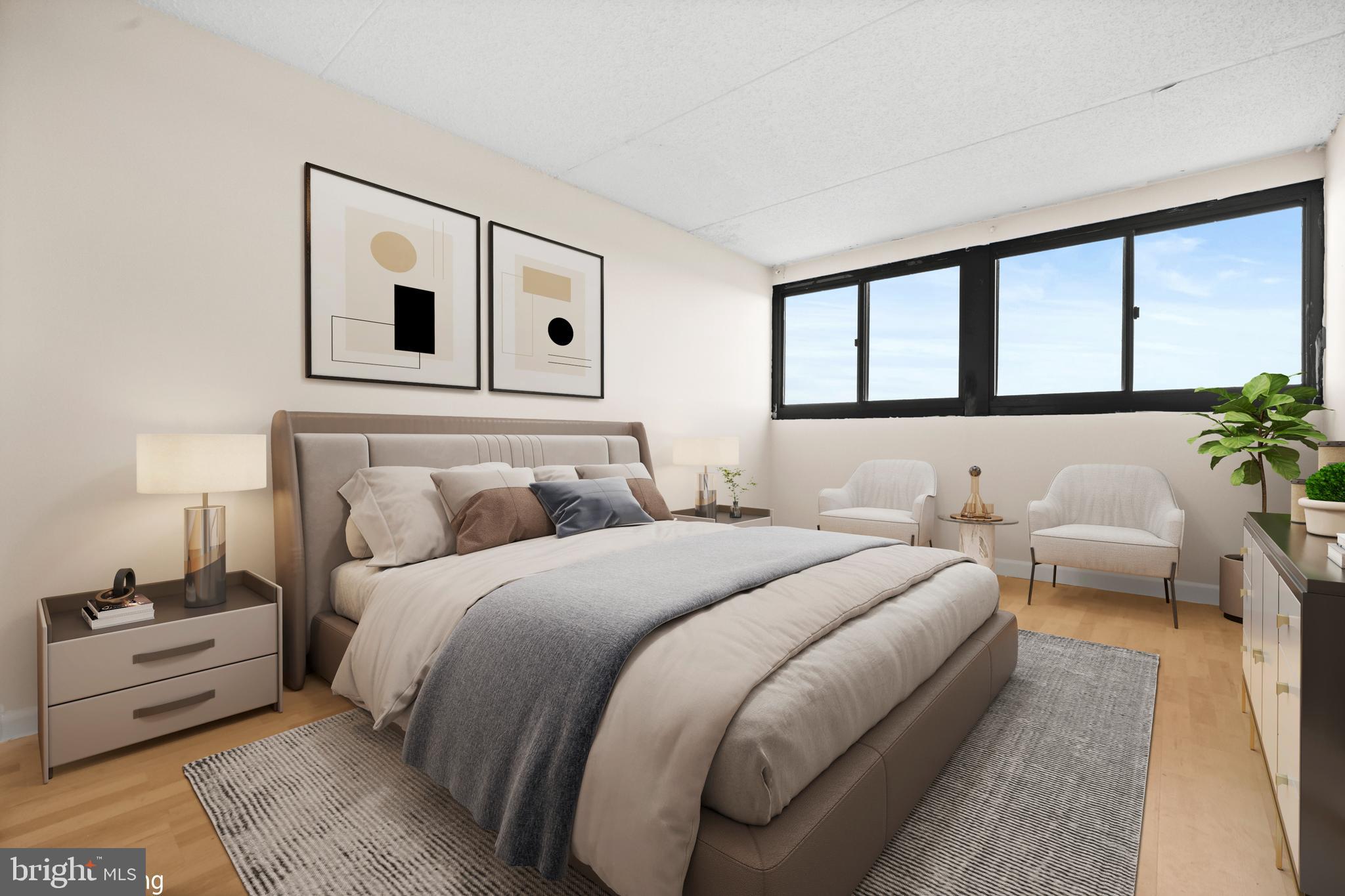 5911 Edsall Road, Unit 1209 Alexandria, VA 22304 - Photo 17 of 30 a bedroom with bed and a large window