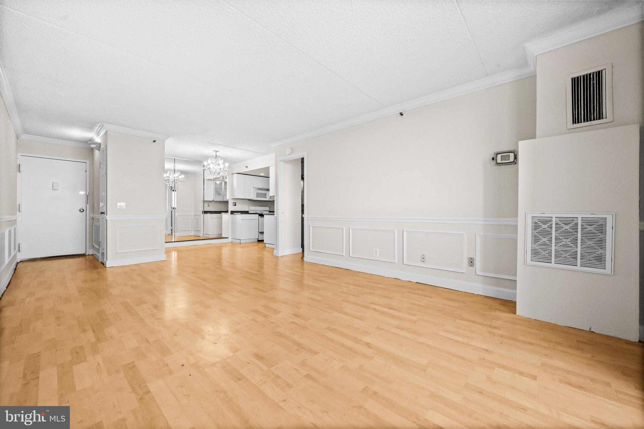 5911 Edsall Road, Unit 1209 Alexandria, VA 22304 - Photo 6 of 30 a view of empty room with wooden floor