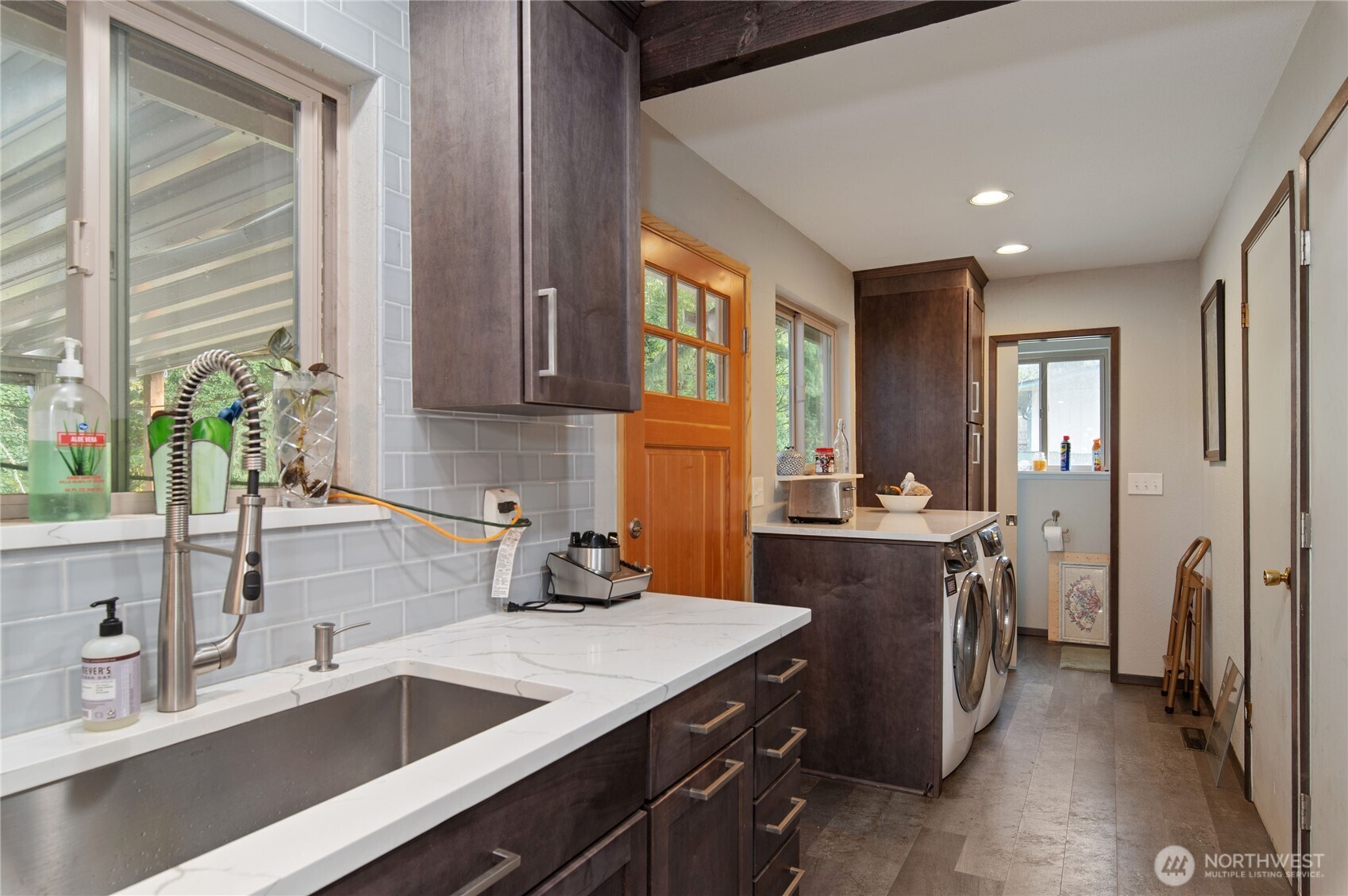 9101 112th Street Southwest Lakewood, WA 98498 - Photo 15 of 27 a kitchen with a sink appliances cabinets and a window