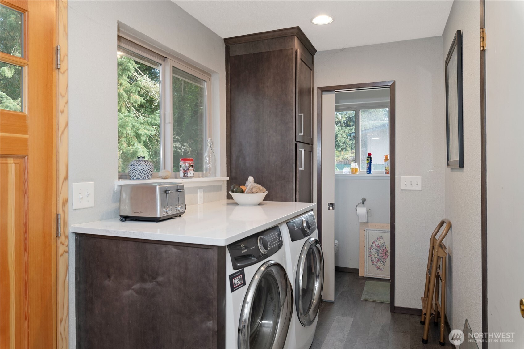 9101 112th Street Southwest Lakewood, WA 98498 - Photo 16 of 27 a utility room with cabinets washer and dryer