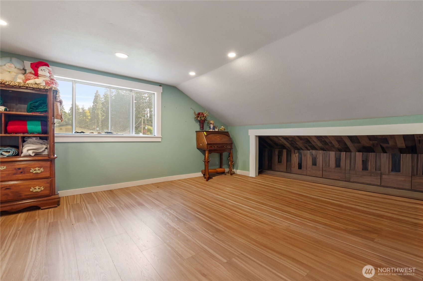 9101 112th Street Southwest Lakewood, WA 98498 - Photo 21 of 27 a view of a livingroom with wooden floor and a window