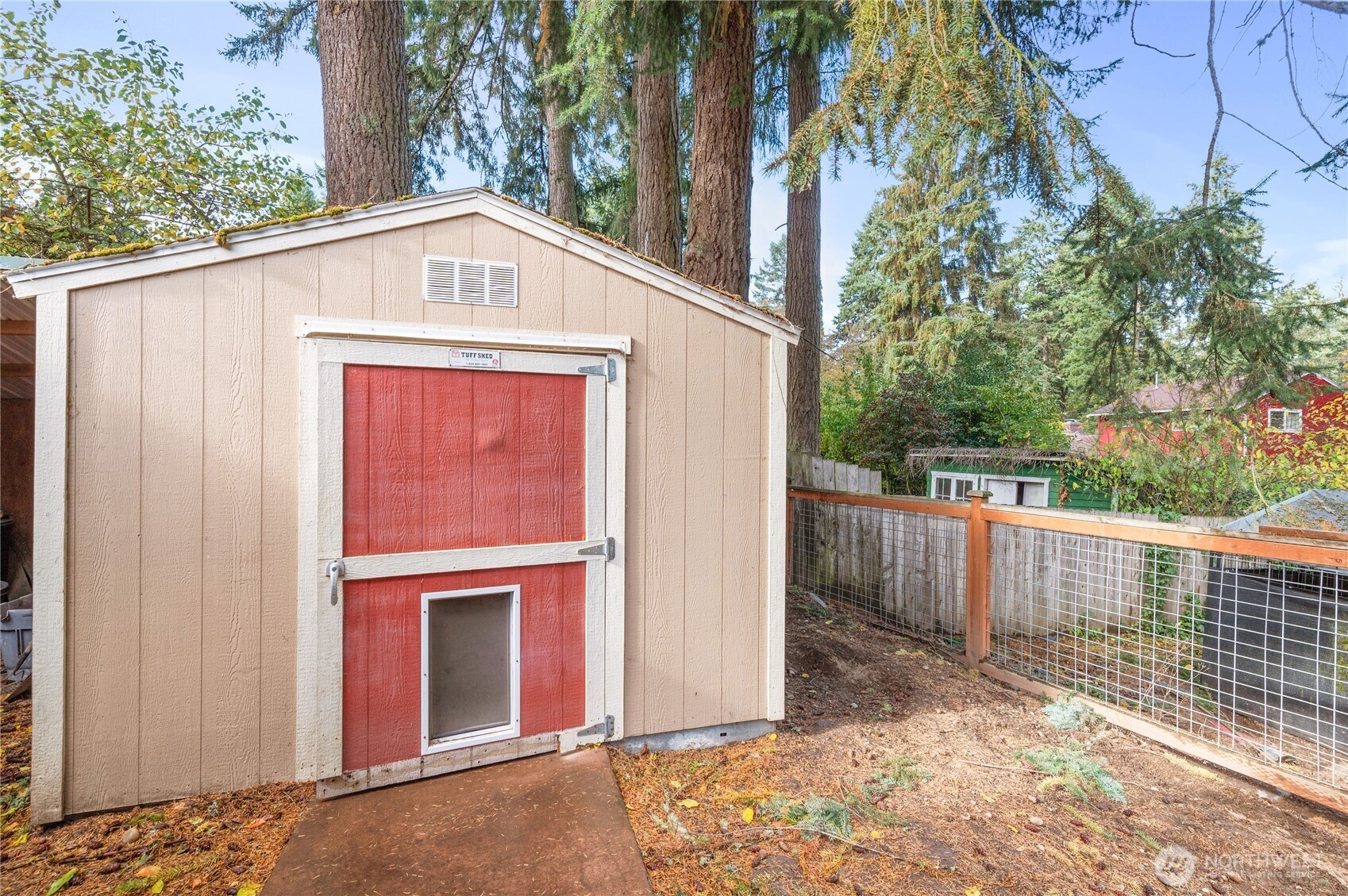9101 112th Street Southwest Lakewood, WA 98498 - Photo 27 of 27 a view of a house with a door and wooden fence