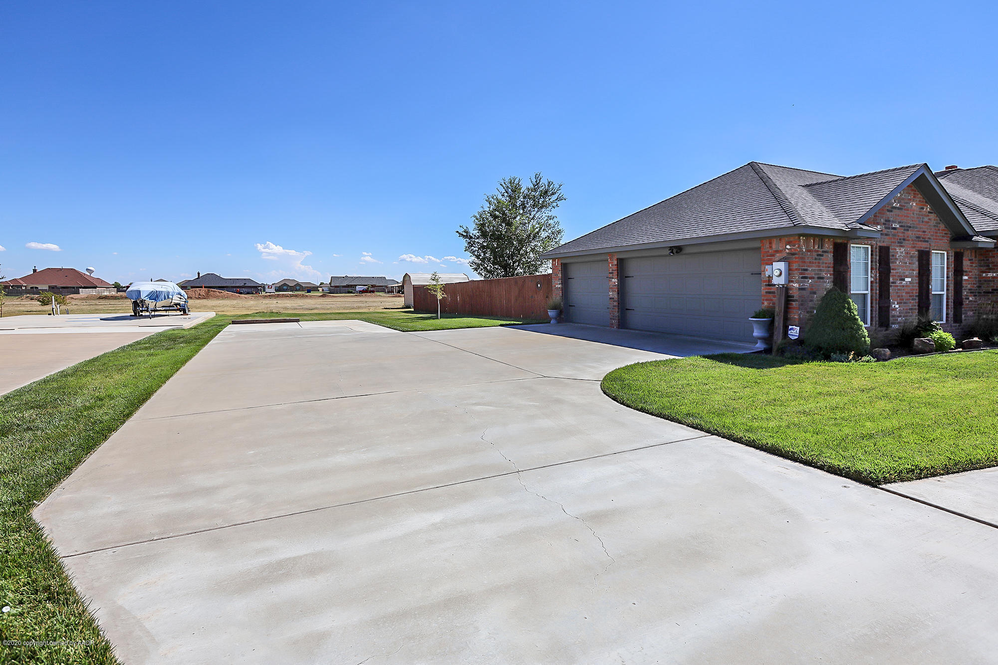 7701 Raburn Lane Canyon, TX 79015 - Photo 4 of 28 Garage and Driveay