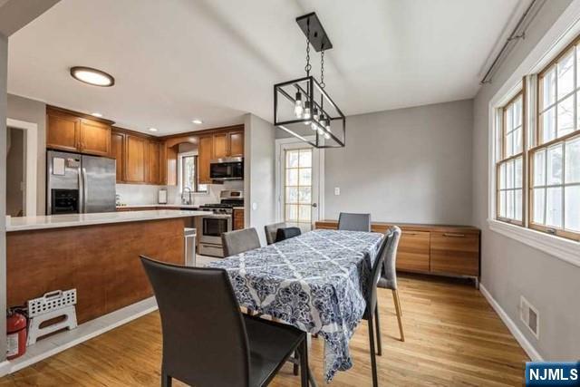 23 Asmus Road Closter, NJ 07624 - Photo 8 of 38 a dining room with furniture and window