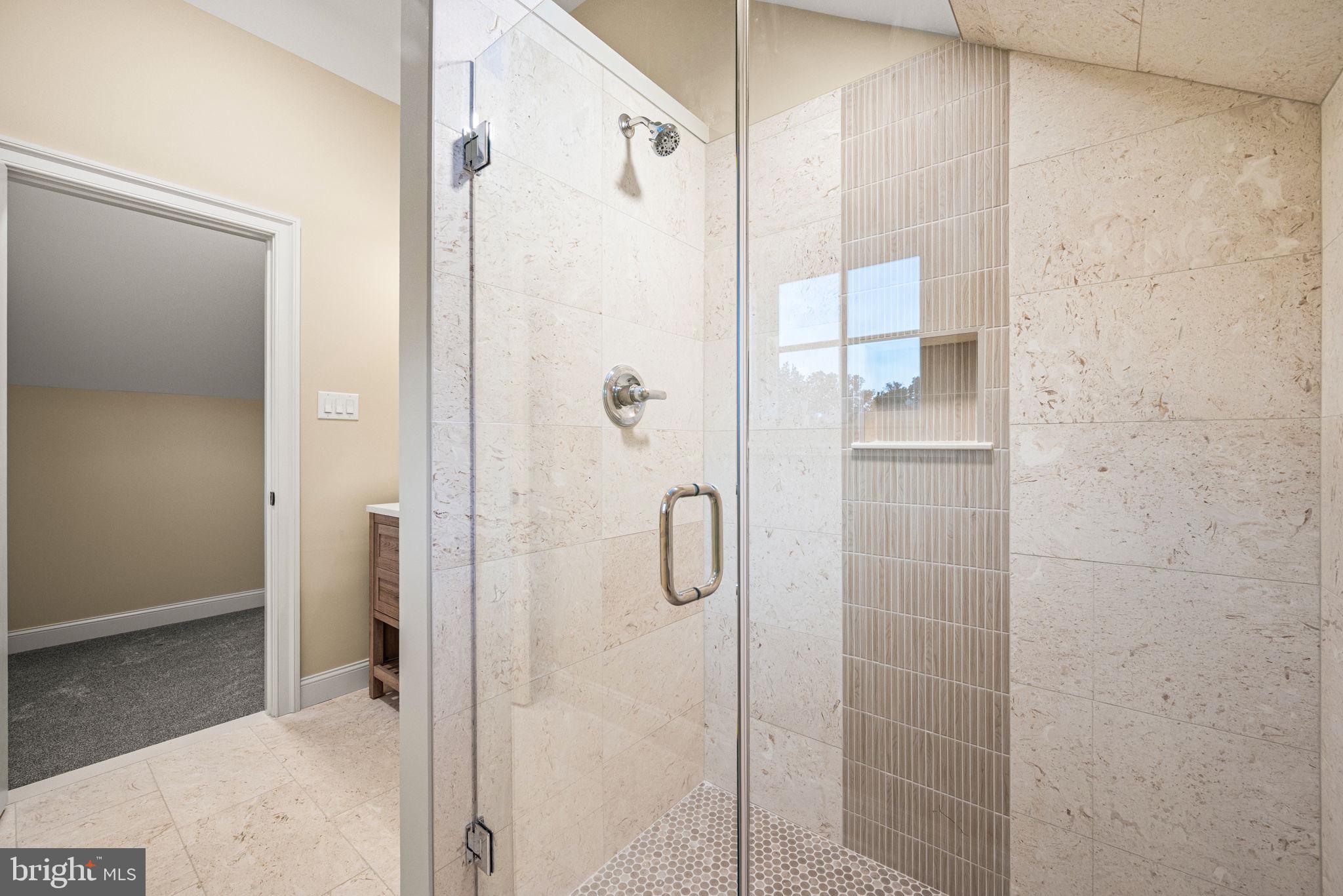 1548 Morstein Road Malvern, PA 19355 - Photo 60 of 80 a bathroom with a glass shower door