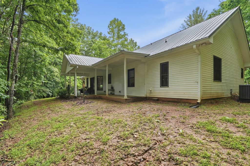 175 Crane Creek Road Young Harris, GA 30582 - Photo 35 of 40 a view of a house with a yard