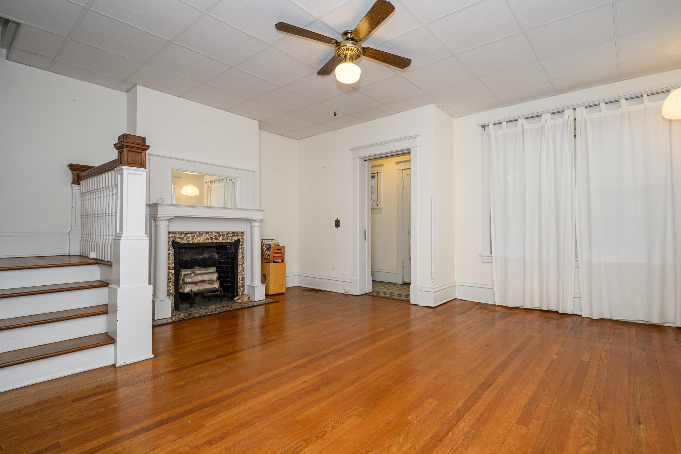 24 Saragossa Street St. Augustine, FL 32084 - Photo 54 of 99 a view of empty room with wooden floor and fan