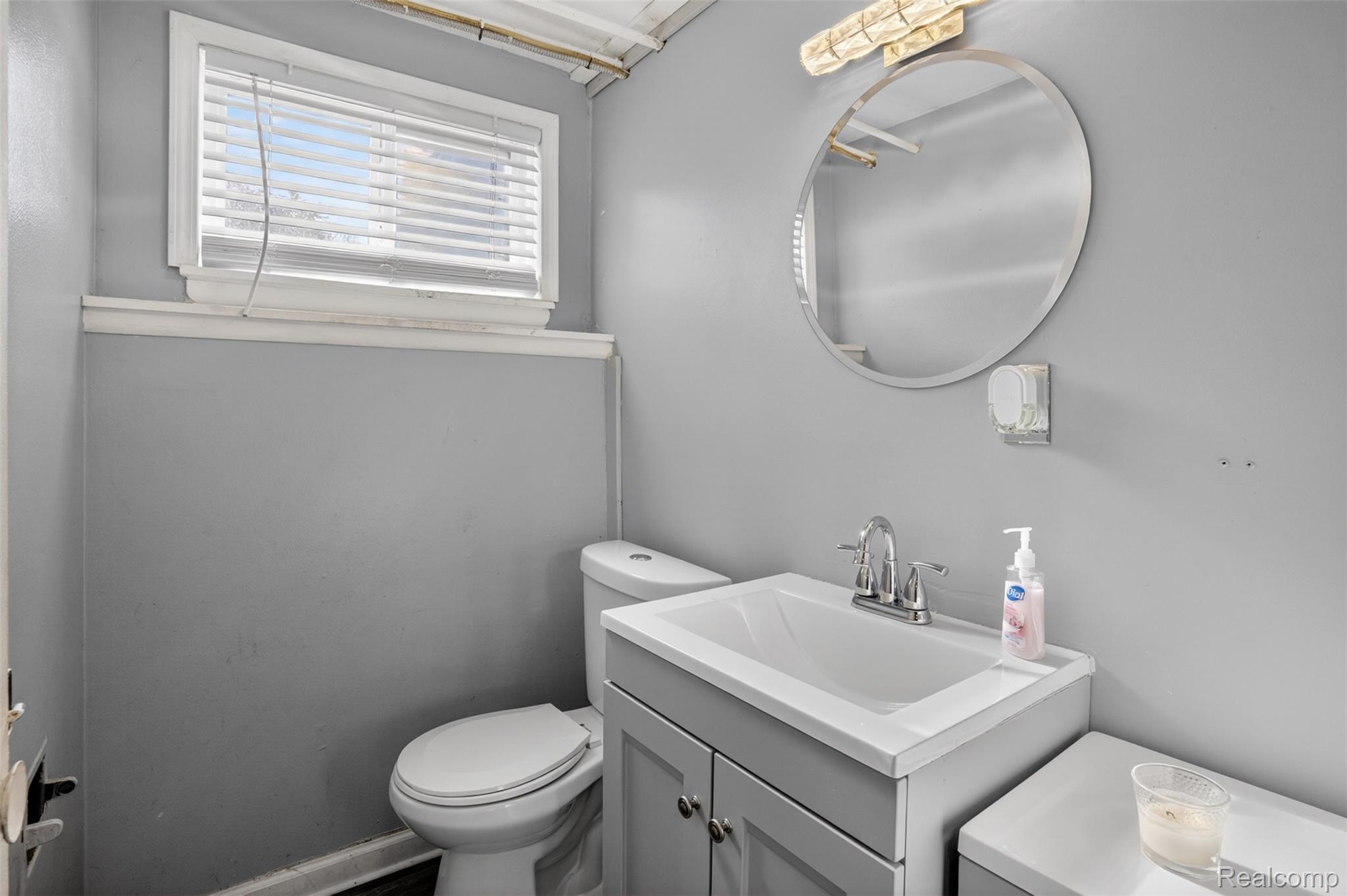 6169 Neff Road Mount Morris, MI 48458 - Photo 34 of 49 Bathroom featuring toilet and vanity