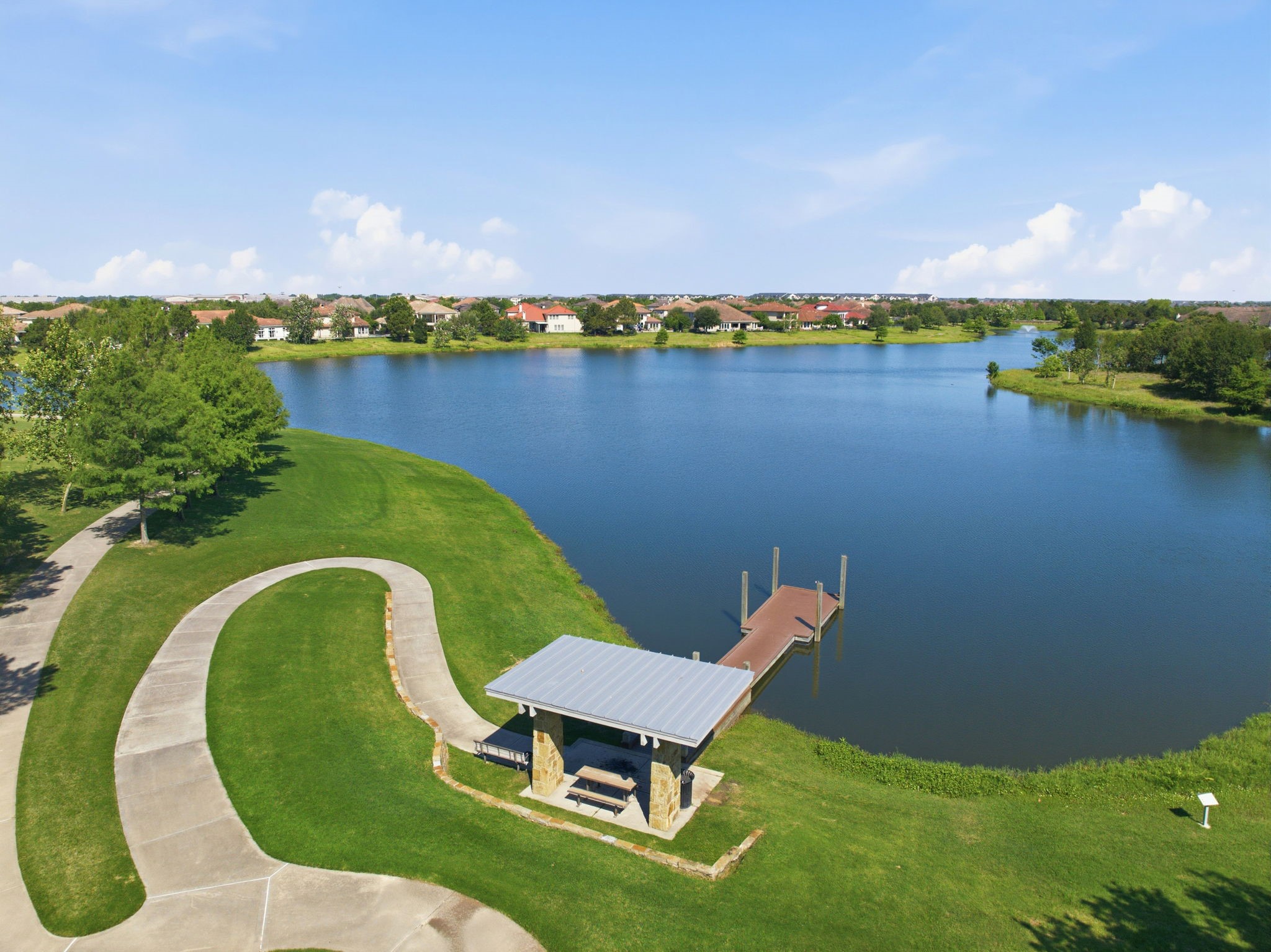 28811 Ember Crest Lane Fulshear, TX 77441 - Photo 37 of 47 an aerial view of a house with a yard and lake view