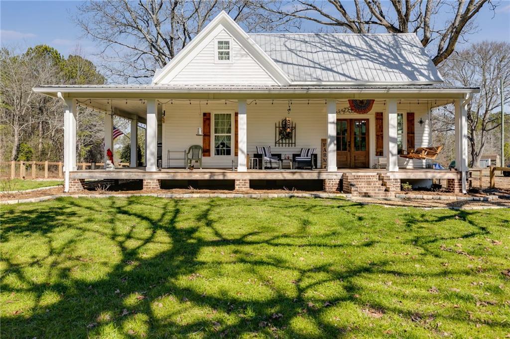 front view of a house with a swimming pool