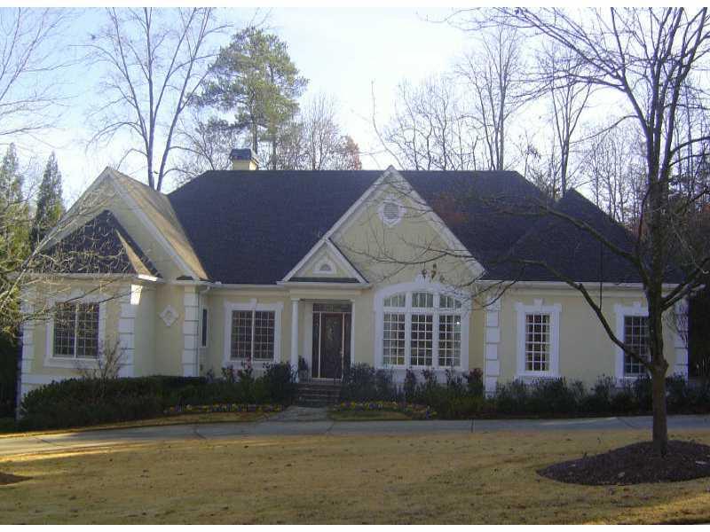 121 Burdette Road Northwest Atlanta, GA 30327 - Photo 1 of 1 Exterior Front. CUSTON HOME ALL ON ONE LEVEL WITH GORGEOUS PRIVATE BACKYARD AND POOL