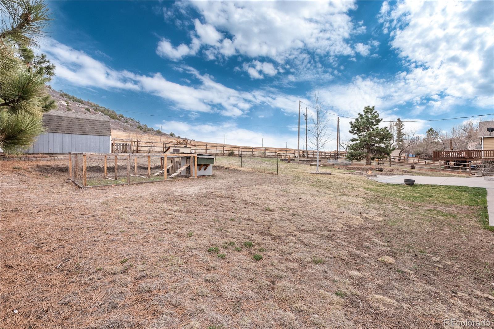 3920 Collins Street Castle Rock, CO 80108 - Photo 33 of 40 a view of dirt road with a building