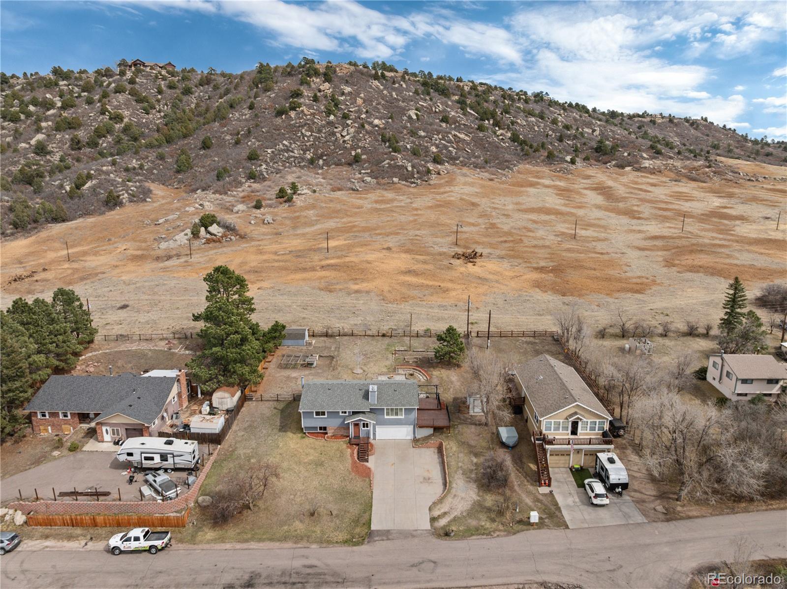 3920 Collins Street Castle Rock, CO 80108 - Photo 35 of 40 an aerial view of a house with ocean view