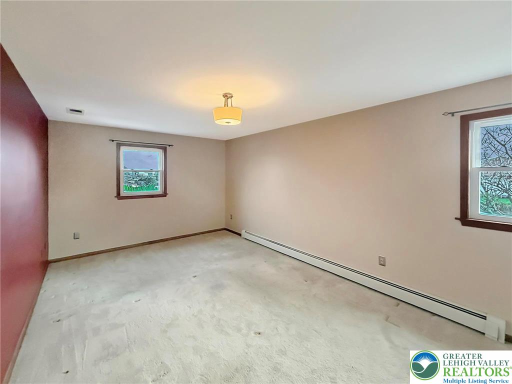 719 Hunter Street Catasauqua, PA 18032 - Photo 26 of 41 an empty room with windows