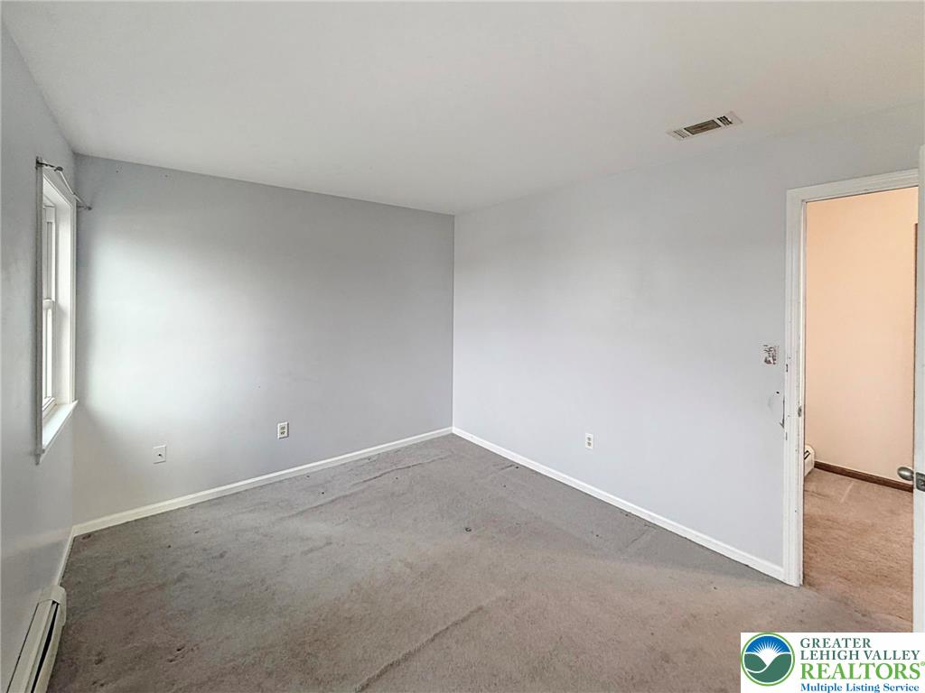 719 Hunter Street Catasauqua, PA 18032 - Photo 33 of 41 a view of an empty room and window