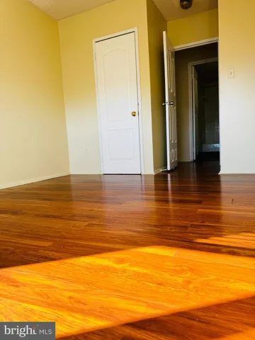 a kitchen with granite countertop a sink and a stove
