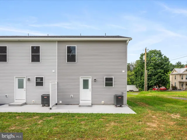 a front view of house with yard