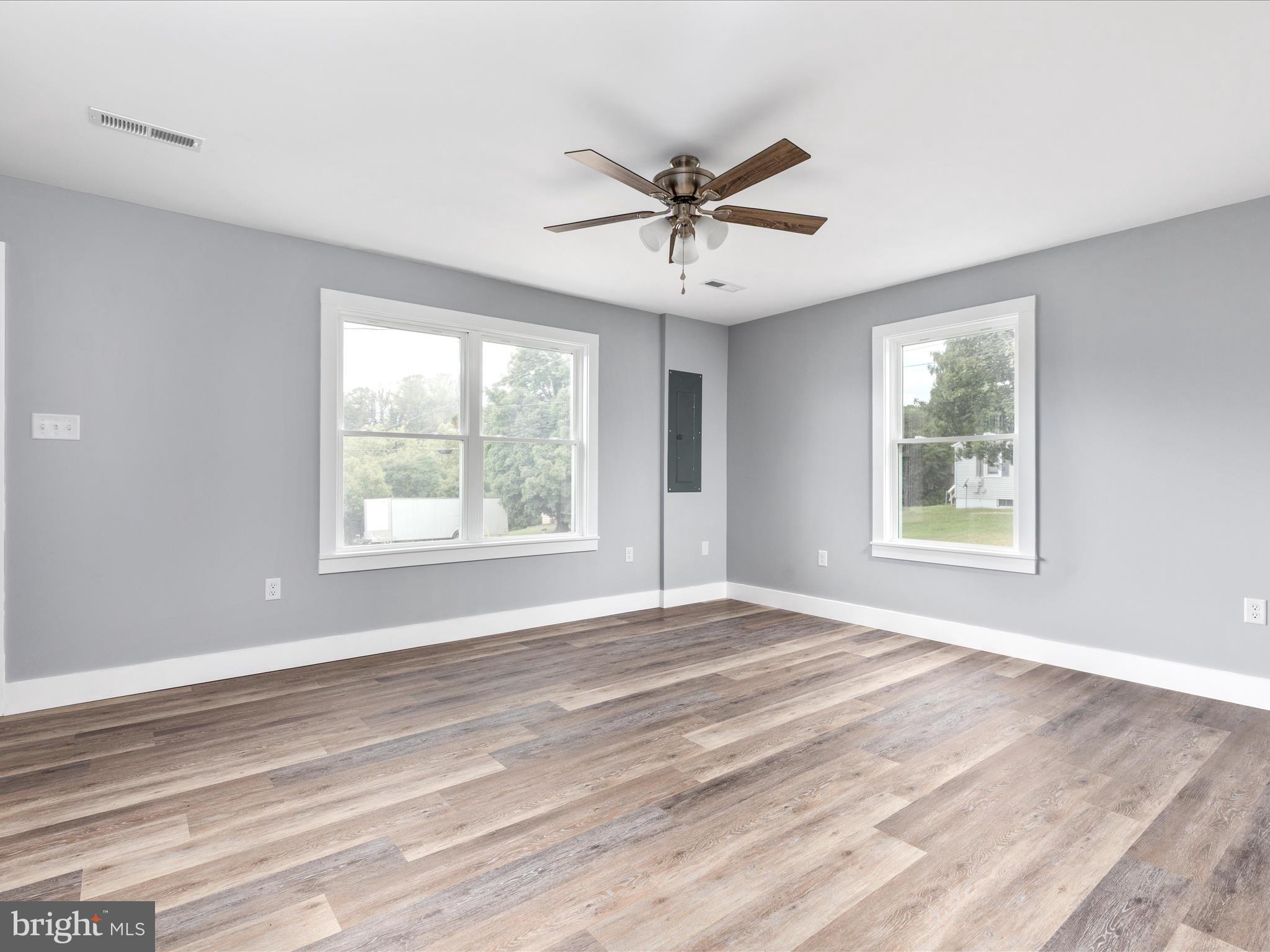 178 Bank Street Mount Jackson, VA 22842 - Photo 6 of 22 Living Room w/ LVP Flooring on Main Level