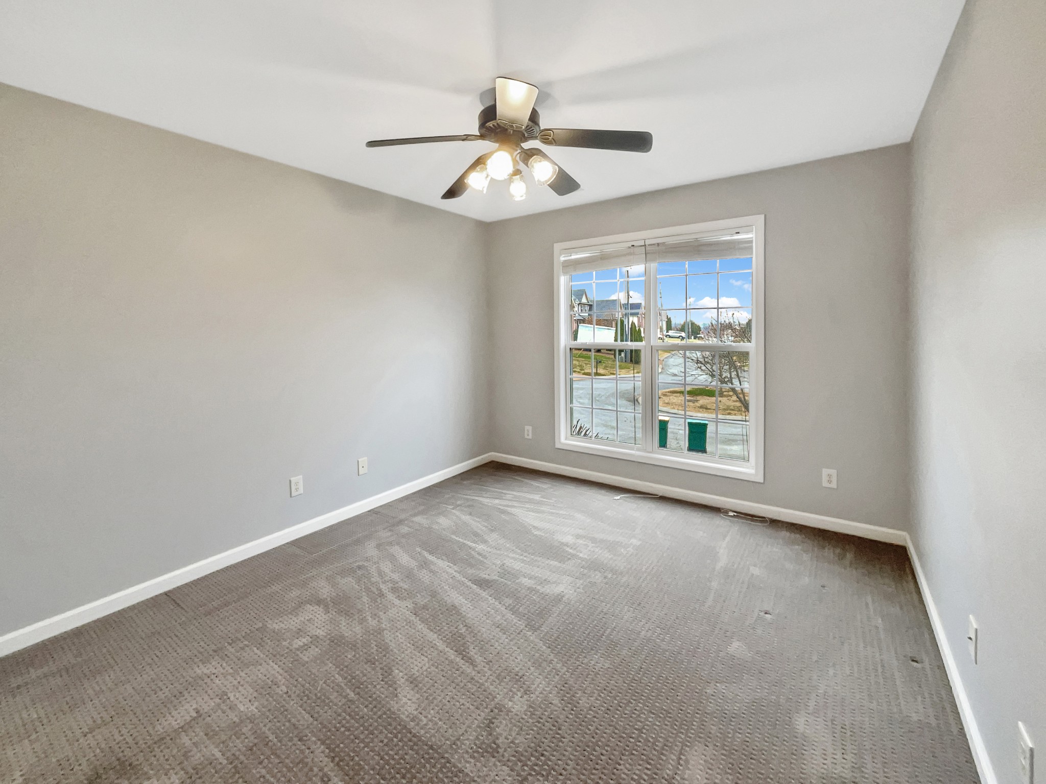 4022 Kristen Street Spring Hill, TN 37174 - Photo 12 of 23 a view of an empty room with a window
