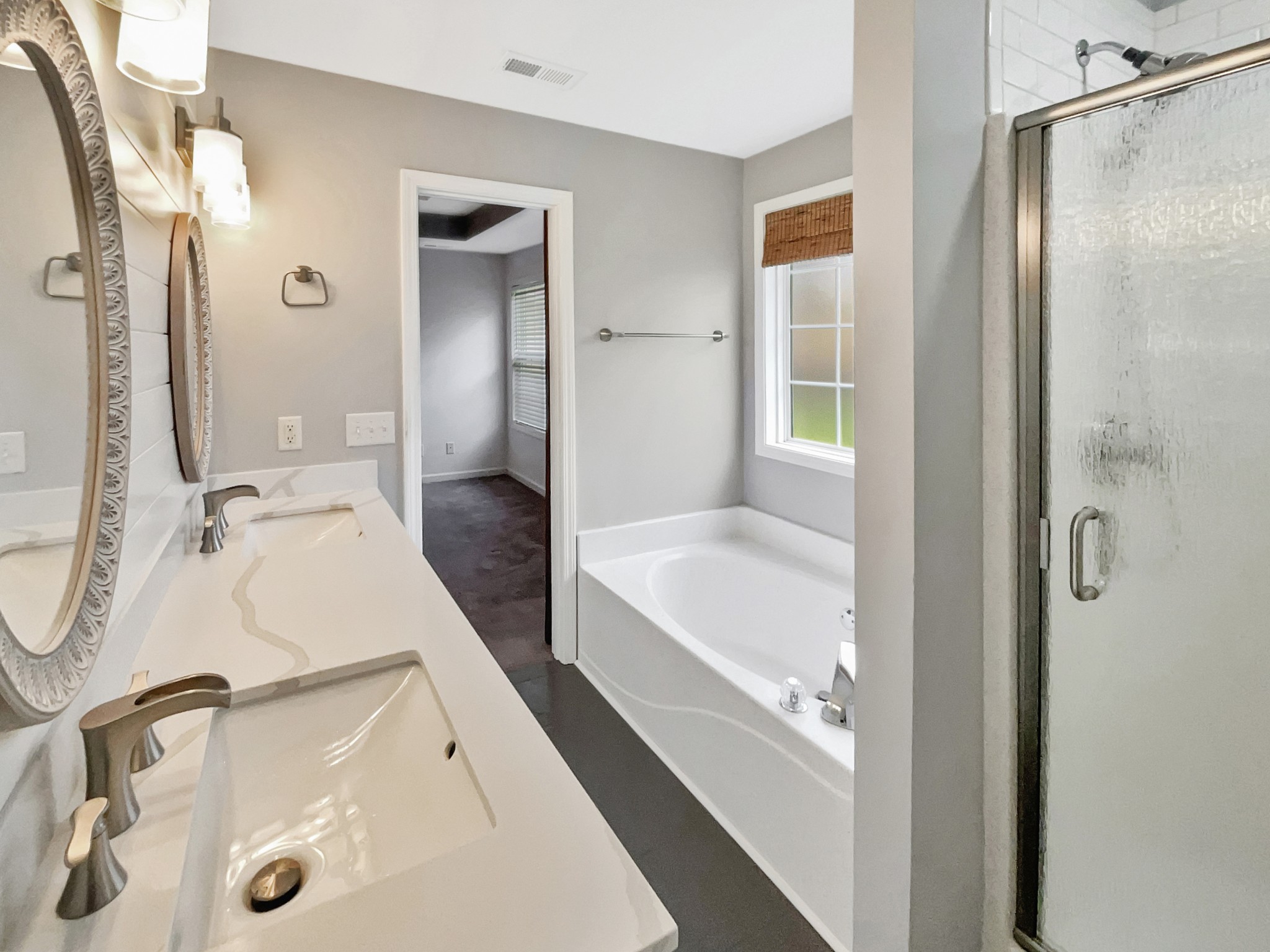 4022 Kristen Street Spring Hill, TN 37174 - Photo 16 of 23 a bathroom with a tub sink and mirror