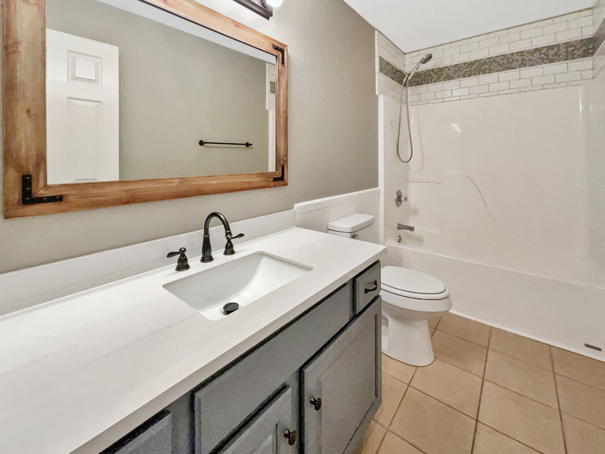 4022 Kristen Street Spring Hill, TN 37174 - Photo 17 of 23 a bathroom with a sink toilet and shower