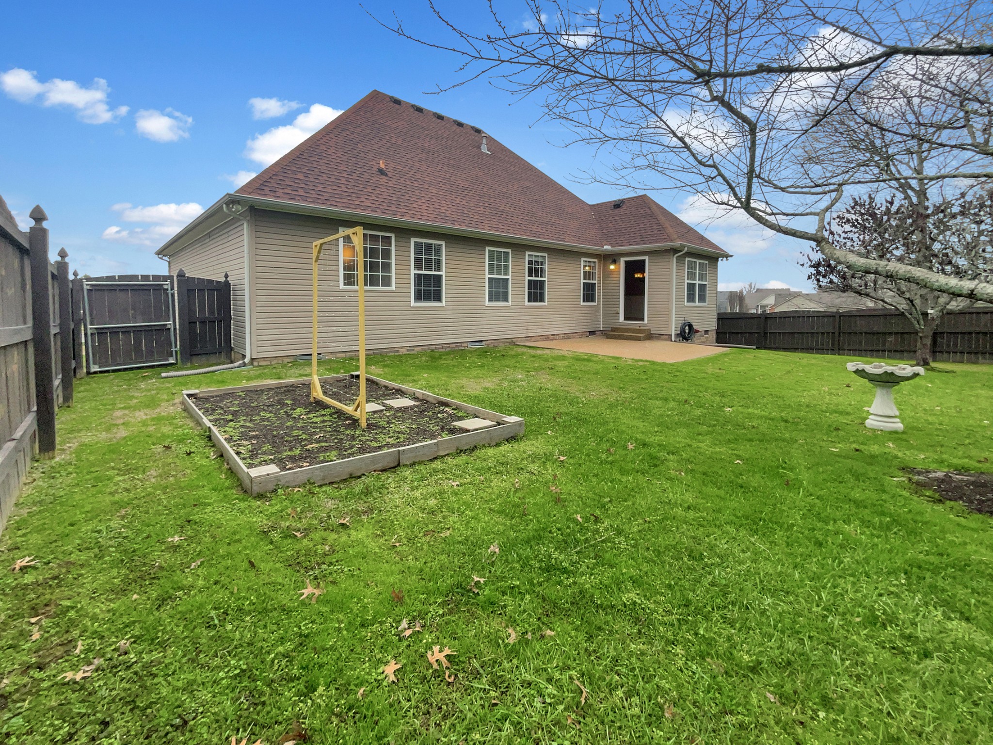 4022 Kristen Street Spring Hill, TN 37174 - Photo 21 of 23 a front view of a house with a yard