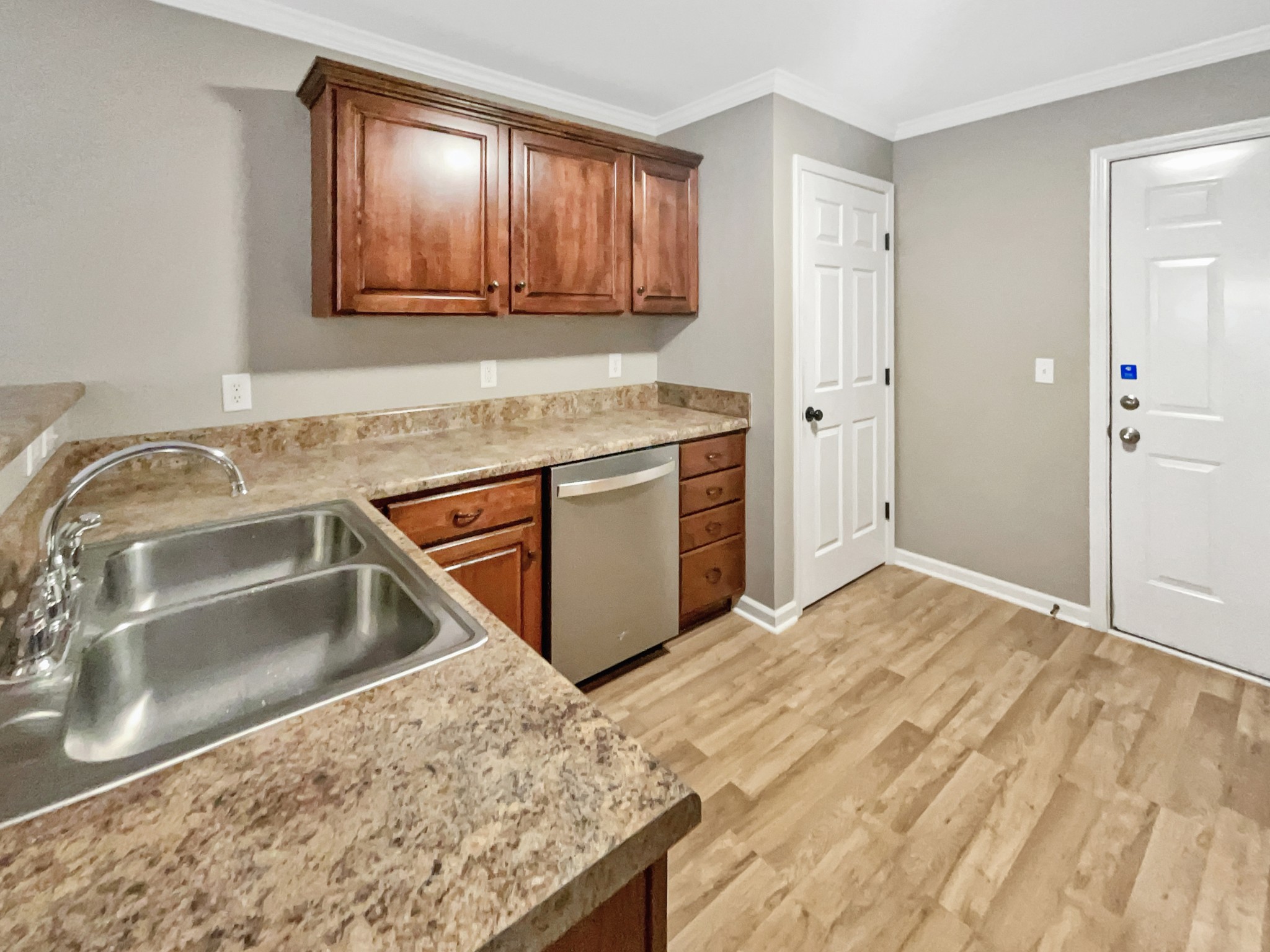 4022 Kristen Street Spring Hill, TN 37174 - Photo 8 of 23 a kitchen with a sink stove and refrigerator