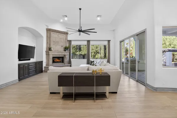 a bedroom with a bed and a fireplace