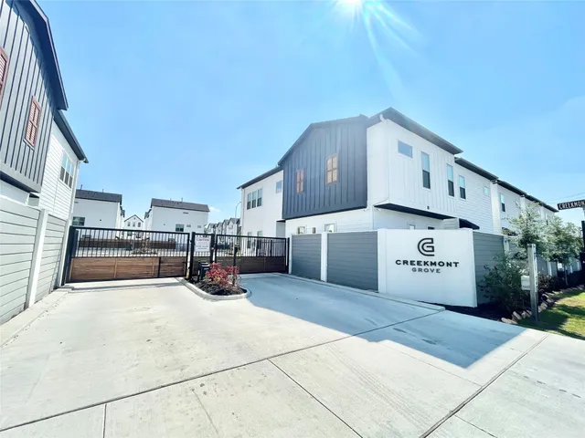 a view of parking and utility room