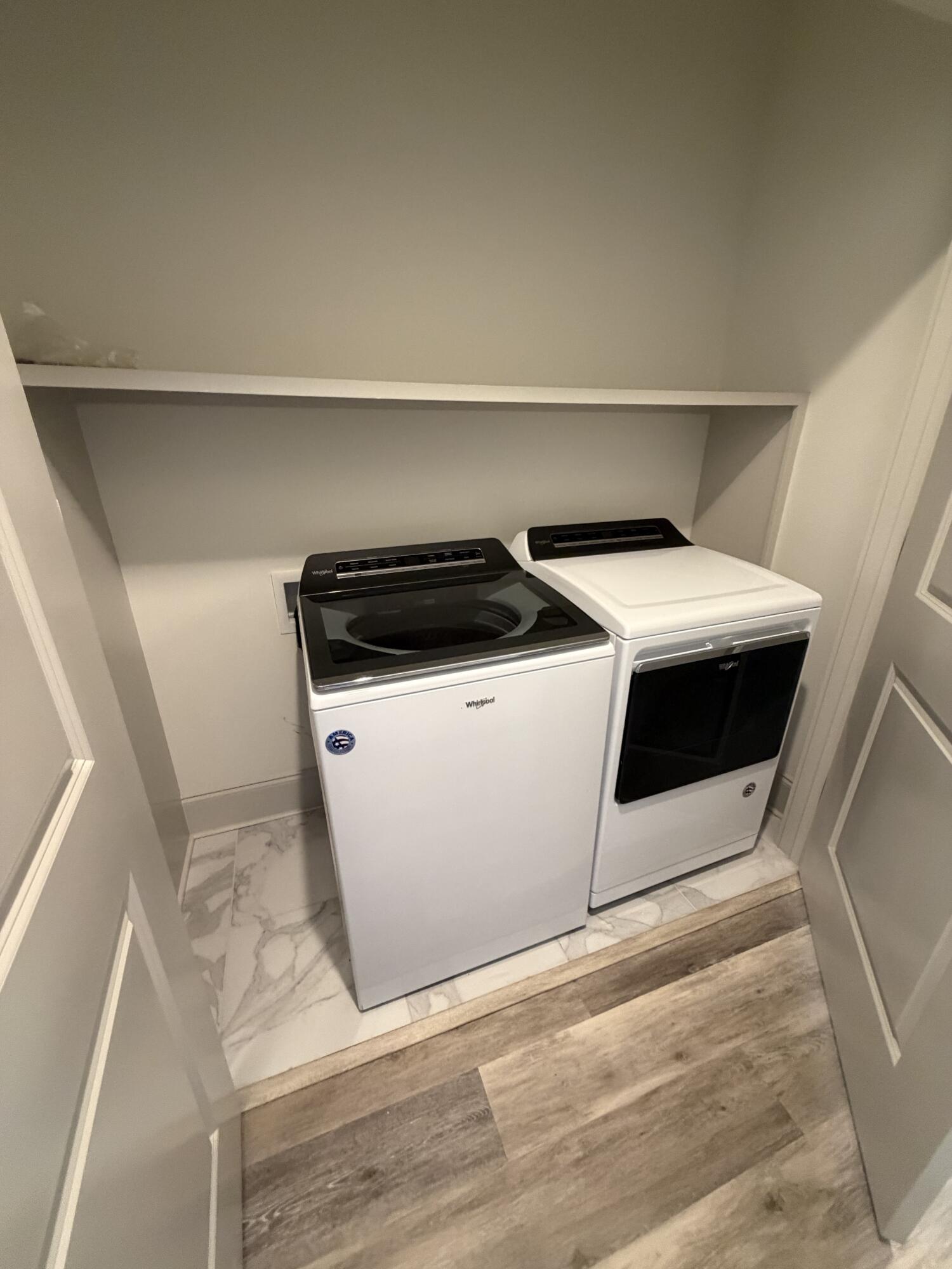 67 Heron's Crossing Santa Rosa Beach, FL 32459 - Photo 12 of 16 a utility room with dryer and washer