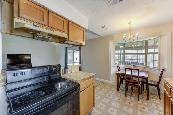 a view of kitchen with breakfast area