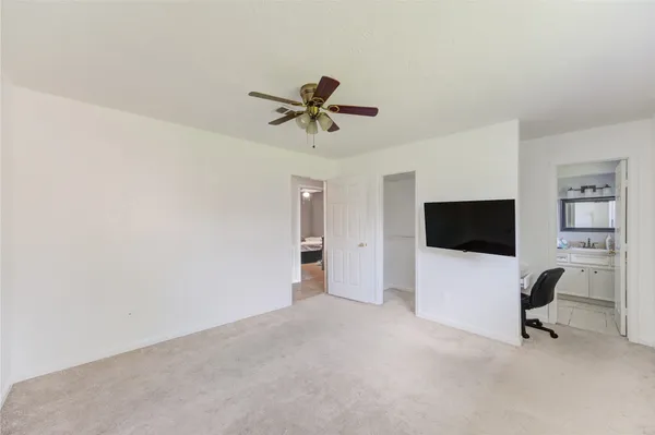 a view of a livingroom with a flat screen tv