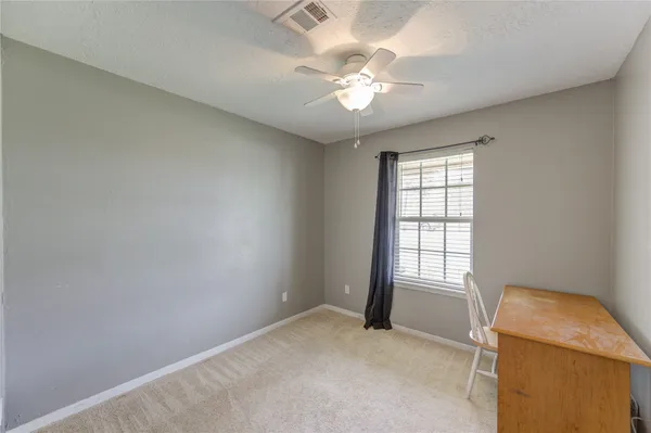 wooden floor and window in a room