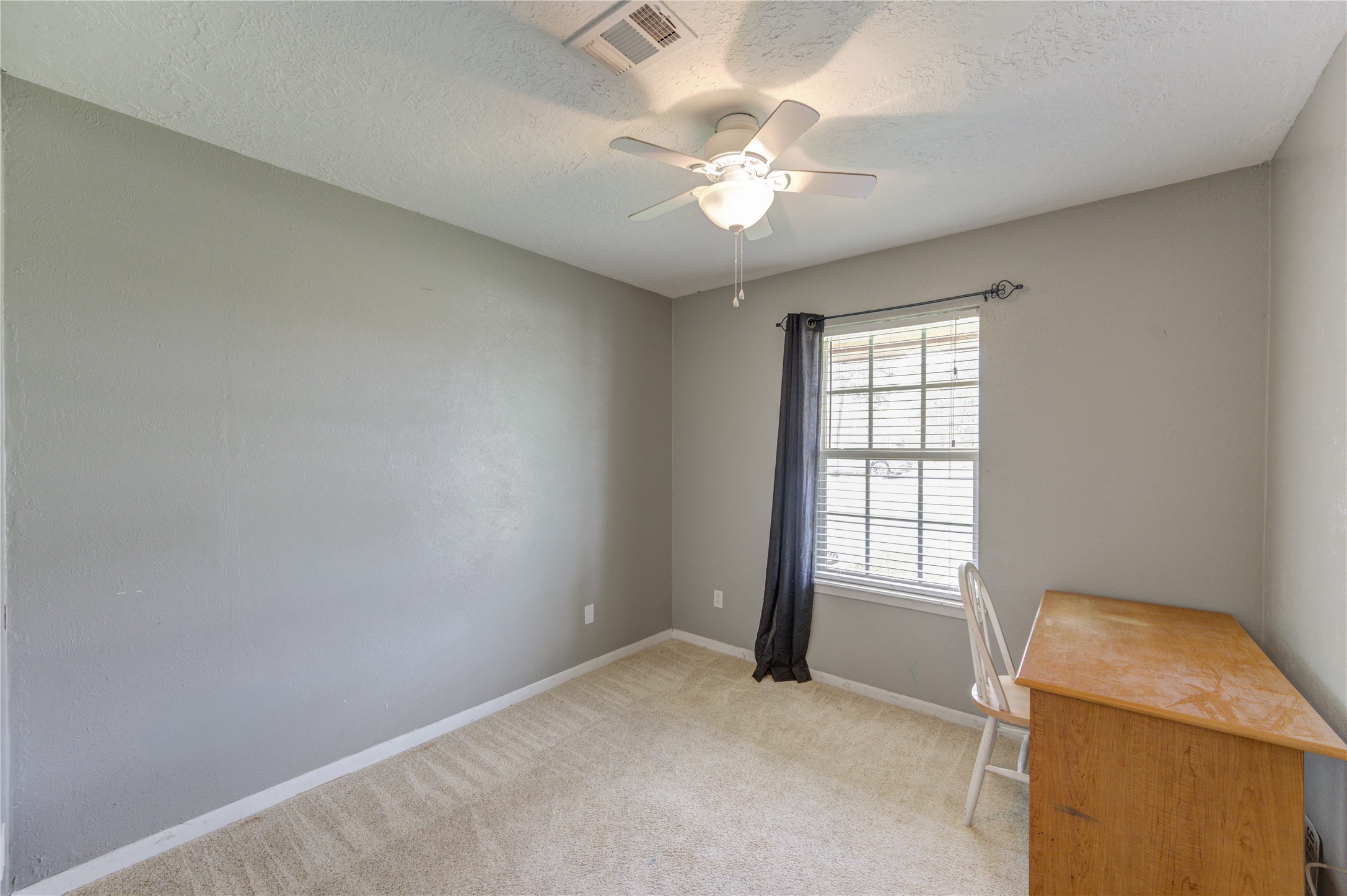 8610 Bluebonnet Street Highlands, TX 77562 - Photo 31 of 45 wooden floor and window in a room