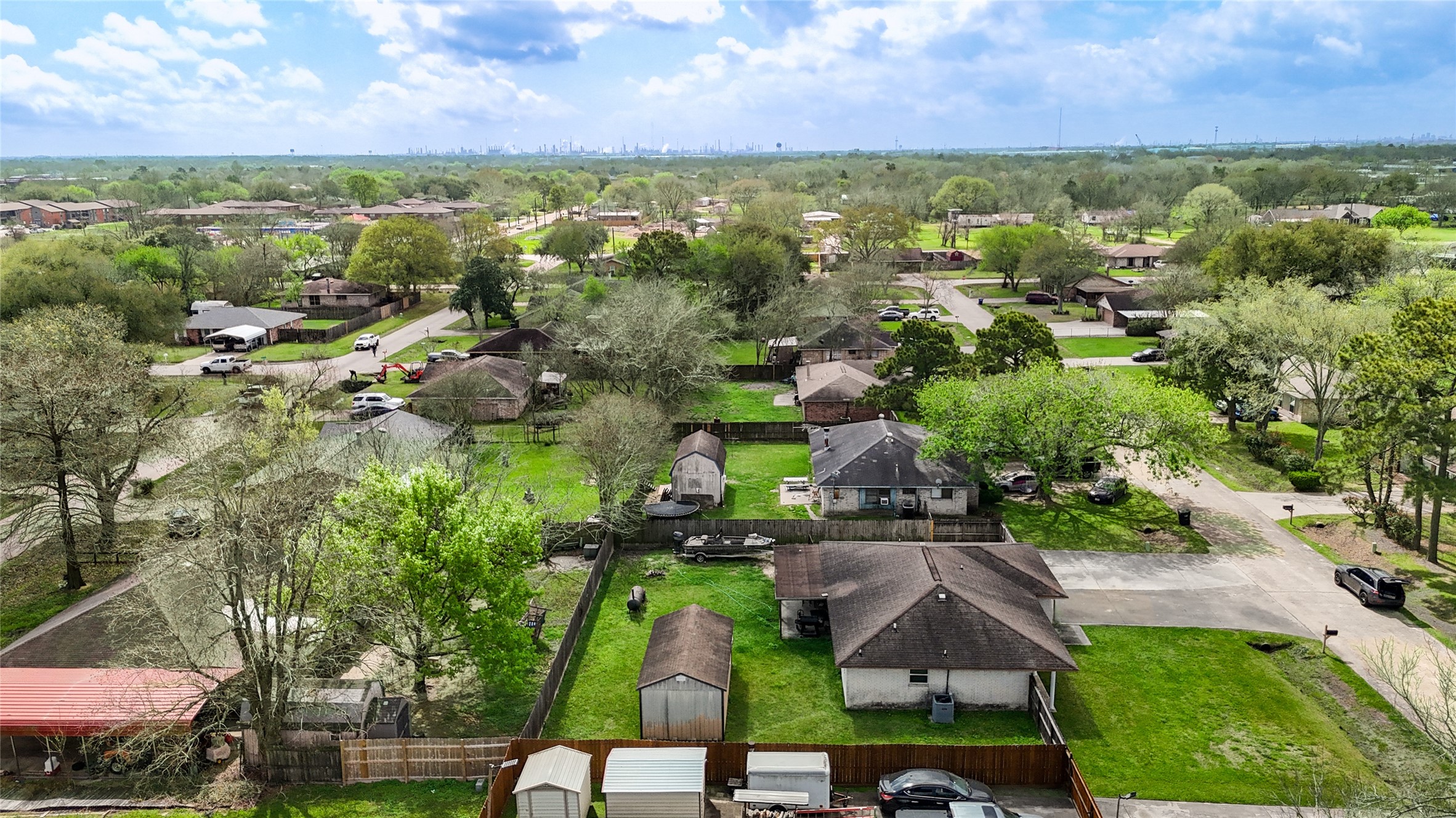 8610 Bluebonnet Street Highlands, TX 77562 - Photo 40 of 45 an aerial view of residential houses with outdoor space and trees